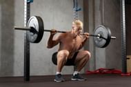 Barbell squats. (Image credits: Freepik)